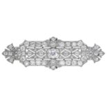A diamond plaque brooch, circa 1915, the pierced rectangular brooch with fanned terminals an...