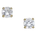A pair of diamond ear studs, each set with a brilliant-cut diamond in a four-claw setting, t...