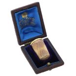 A 19th century gold thimble, of traditional design, fitted case by Henry Tessier, length 2...