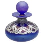 A silver overlaid blue iridescent glass perfume bottle and stopper, of squat globular form,...