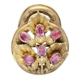 A mid 19th century gem-set brooch, the gold knot with bead and wirework decoration, applied...