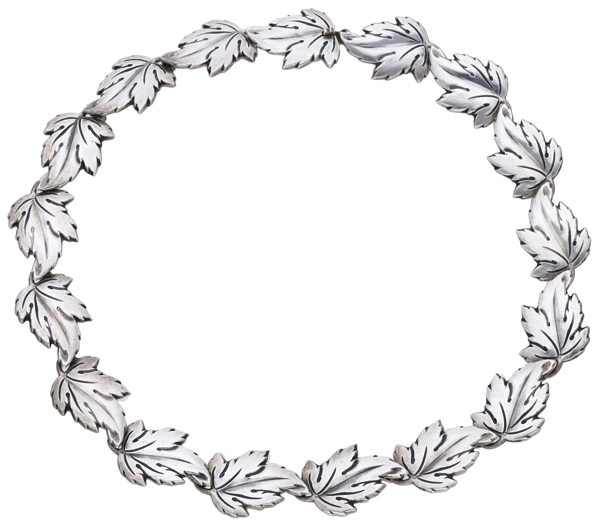 A Danish silver necklace, the articulated necklace of overlapping leaf design, stamped 'STER...