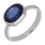 A sapphire ring, the oval mixed-cut sapphire collet-set to a plain polished band, ring size...
