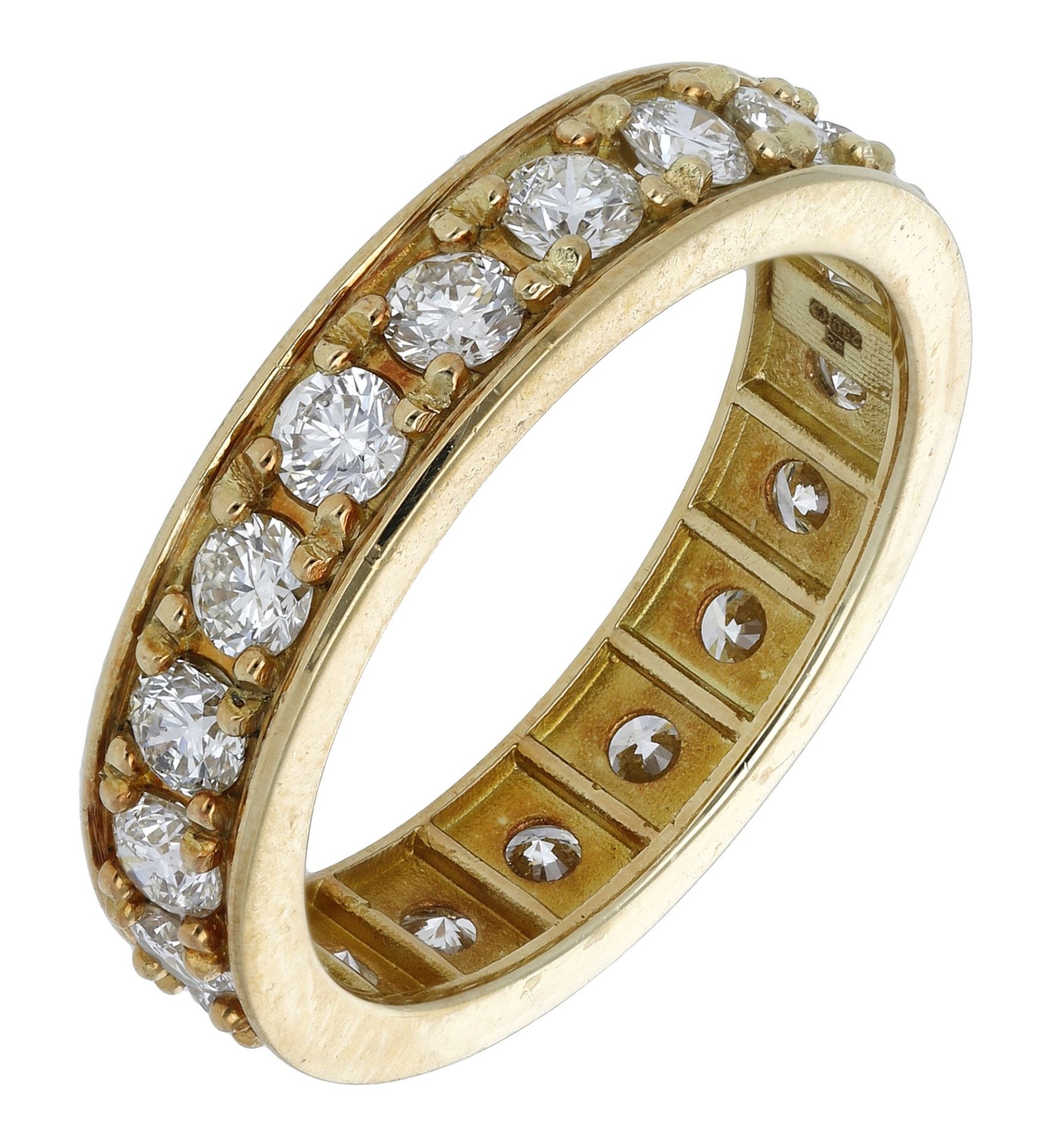 An 18ct yellow gold diamond eternity ring, claw-set throughout with brilliant-cut diamonds,...