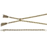 An 18ct gold ropetwist chain necklace and bracelet, the necklace conjoined to the front, sus...