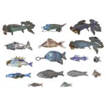 A collection of 13 fish pendants, mostly enamelled, two fish charms and a Victorian silver f...