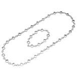 A Finnish silver 'Ruutu' chain necklace and bracelet suite, designed by Jorma Laine for Kult...