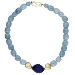 An aquamarine and lapis lazuli necklace by Jane Macintosh, the polished aquamarine beads lea...