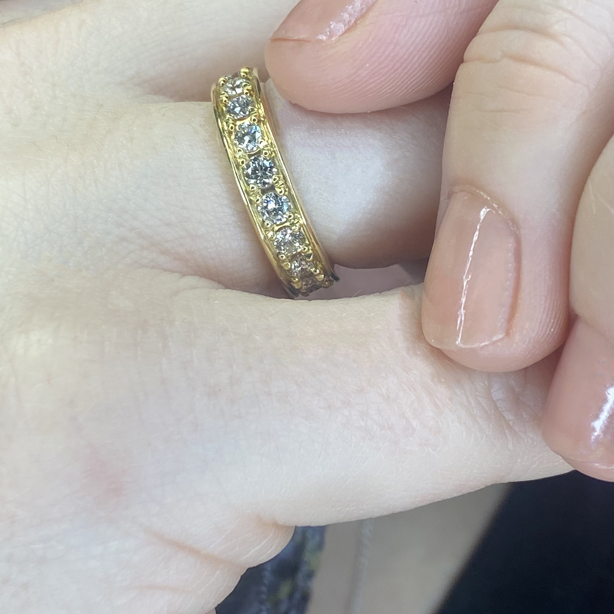 An 18ct yellow gold diamond eternity ring, claw-set to the front with brilliant-cut diamonds... - Image 2 of 2