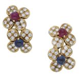 A pair of gem-set earrings by Vourakis, of flowerhead design, set with sapphire and ruby cab...