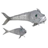 Two Spanish silver articulated fish, with dorsal and pelvic fins, green cabochon eyes and cl...