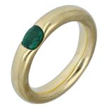 An emerald ring, the polished band tension-set with an oval-cut emerald, stamped '750', assa...