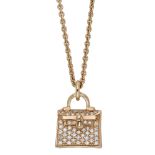 An 18ct rose gold Kelly Amulette pendant on chain by HermÃ¨s, realistically modelled as a Her...