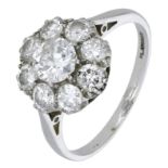 A diamond cluster ring, set throughout with old-cut and transitional-cut diamonds, stamped '...