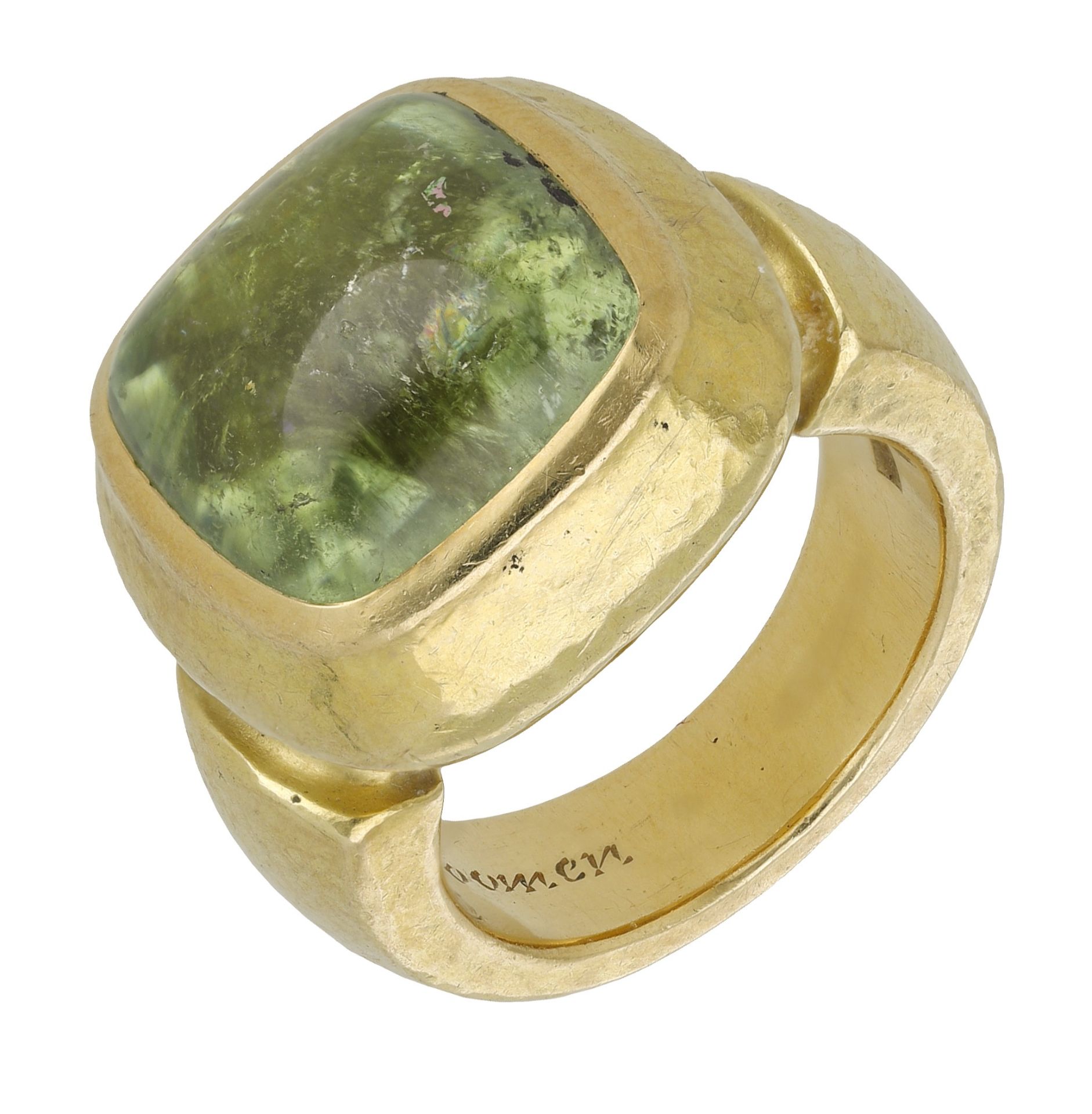 A peridot ring by Leo de Vroomen, 2007, the heavy gold mount with lightly hammered finish, c...