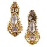A pair of gem-set ear pendants, circa 1830, the elongated drops with cannetille decoration t...