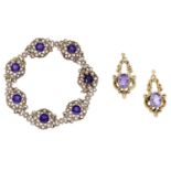 An amethyst bracelet and earrings, the 9ct gold bracelet formed as a series of flowerhead cl...
