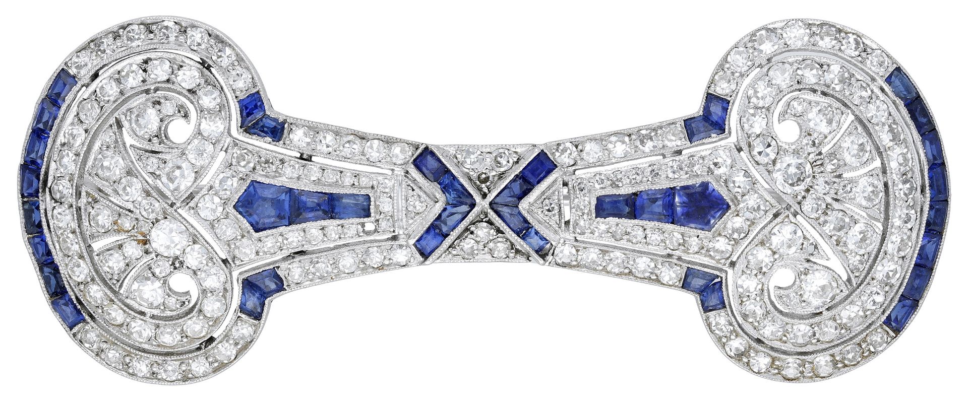 An Art Deco sapphire and diamond brooch, of waisted design with oval terminals, set througho...