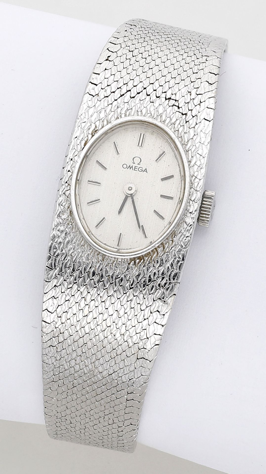 Omega. A lady's white gold bracelet watch, circa 1972. Movement: cal. 485, manual winding,...