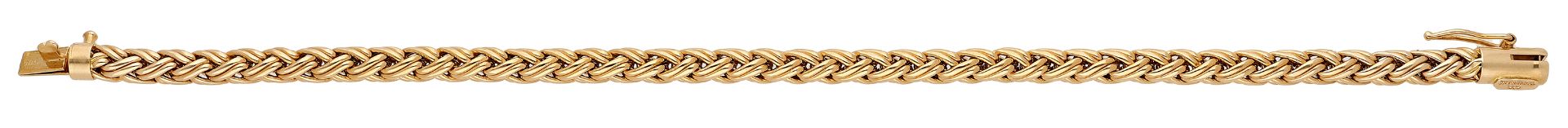 A bracelet by Tiffany & Co, of woven link design, signed 'TIFFANY & CO', stamped '585', 'PAT...