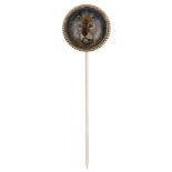 A Victorian reverse painted intaglio domed crystal stickpin, circa 1870, the rock crystal en...