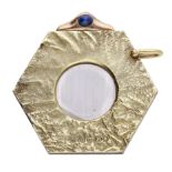 A 9ct gold and sapphire set cigar cutter by Ramsden & Roed Ltd, 1970, the hexagonal shaped...