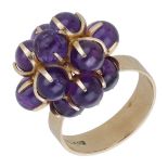 A Finish amethyst bead dress ring, circa 1970, designed by Tuntematon Okand Pori, the cluste...