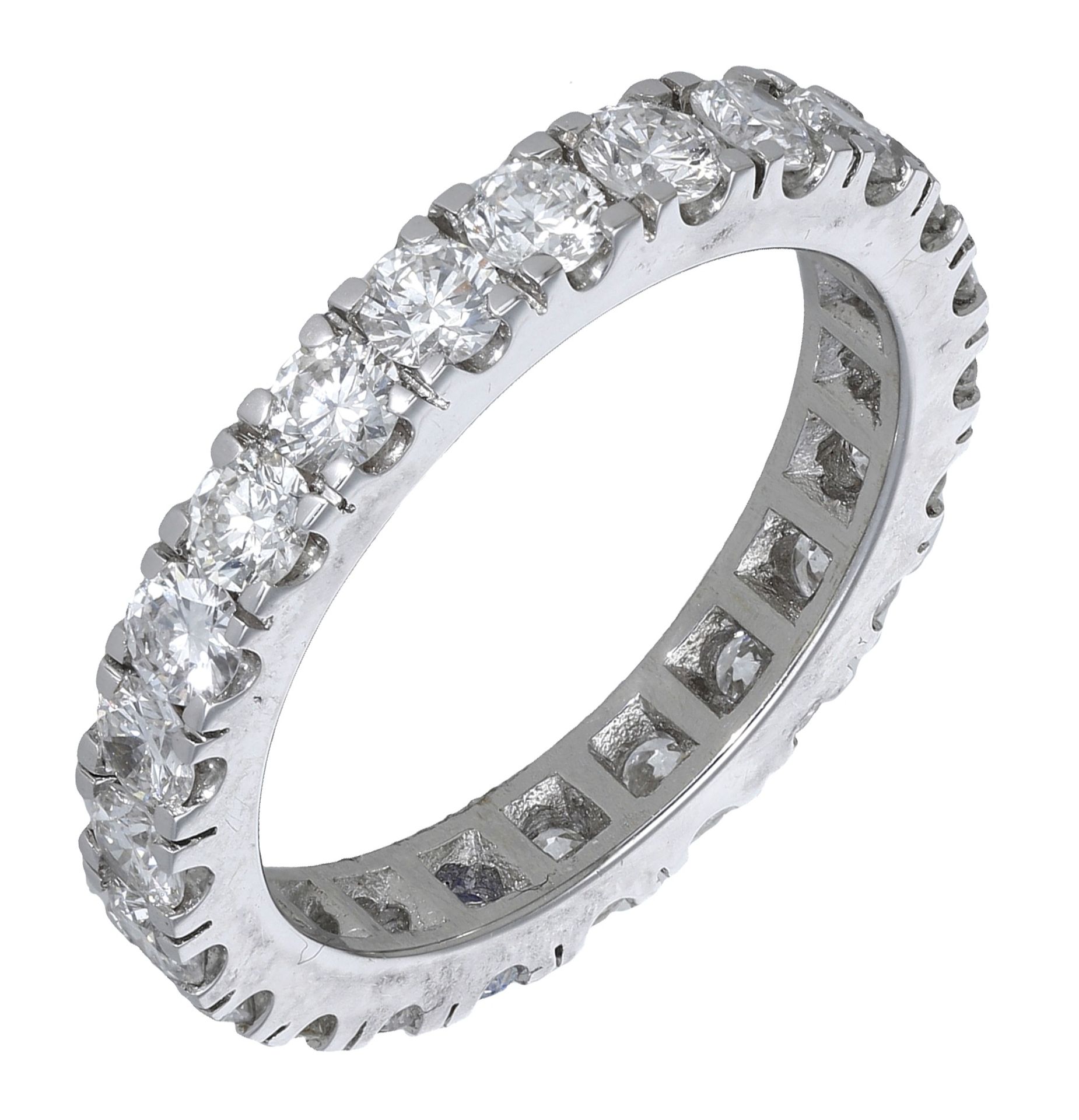 An 18ct white gold diamond eternity ring, 2010, claw-set throughout with brilliant-cut diamo...