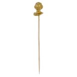 A cast gold stickpin by WiÃ¨se, French, late 19th century, modelled as the head of the ancien...