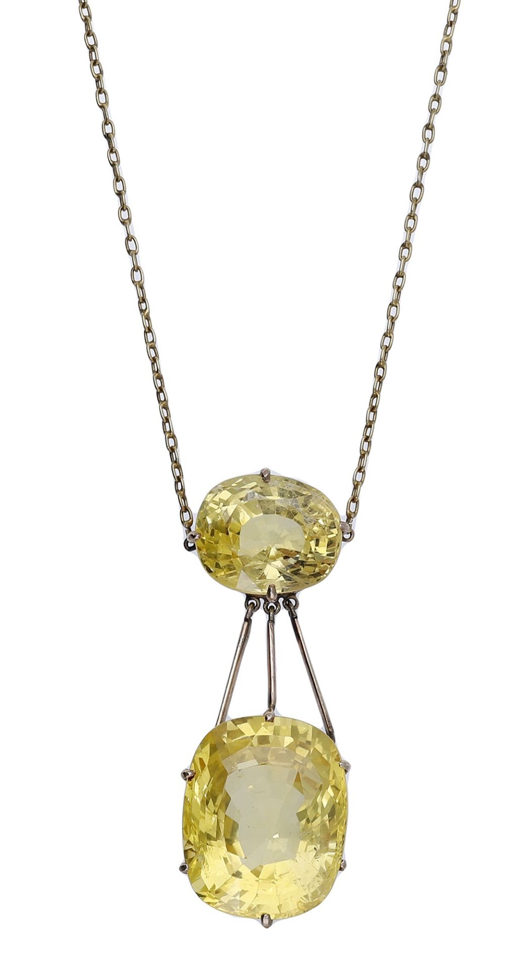 An early 20th century Sri Lankan yellow sapphire pendant and a pair of yellow sapphire earri...