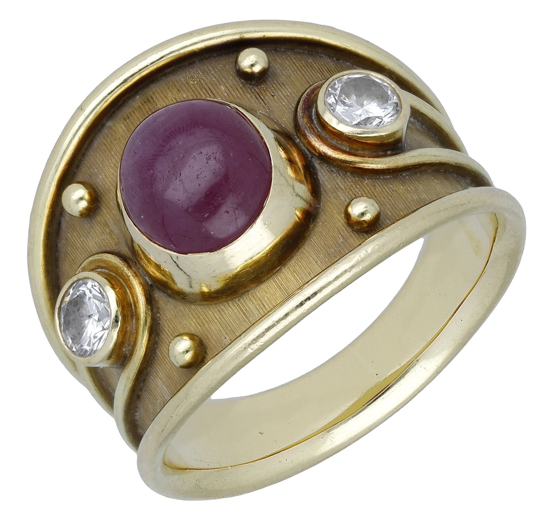 An 18ct gold ruby and diamond set dress ring by Leo de Vroomen, 1978, the broadly tapered ba...