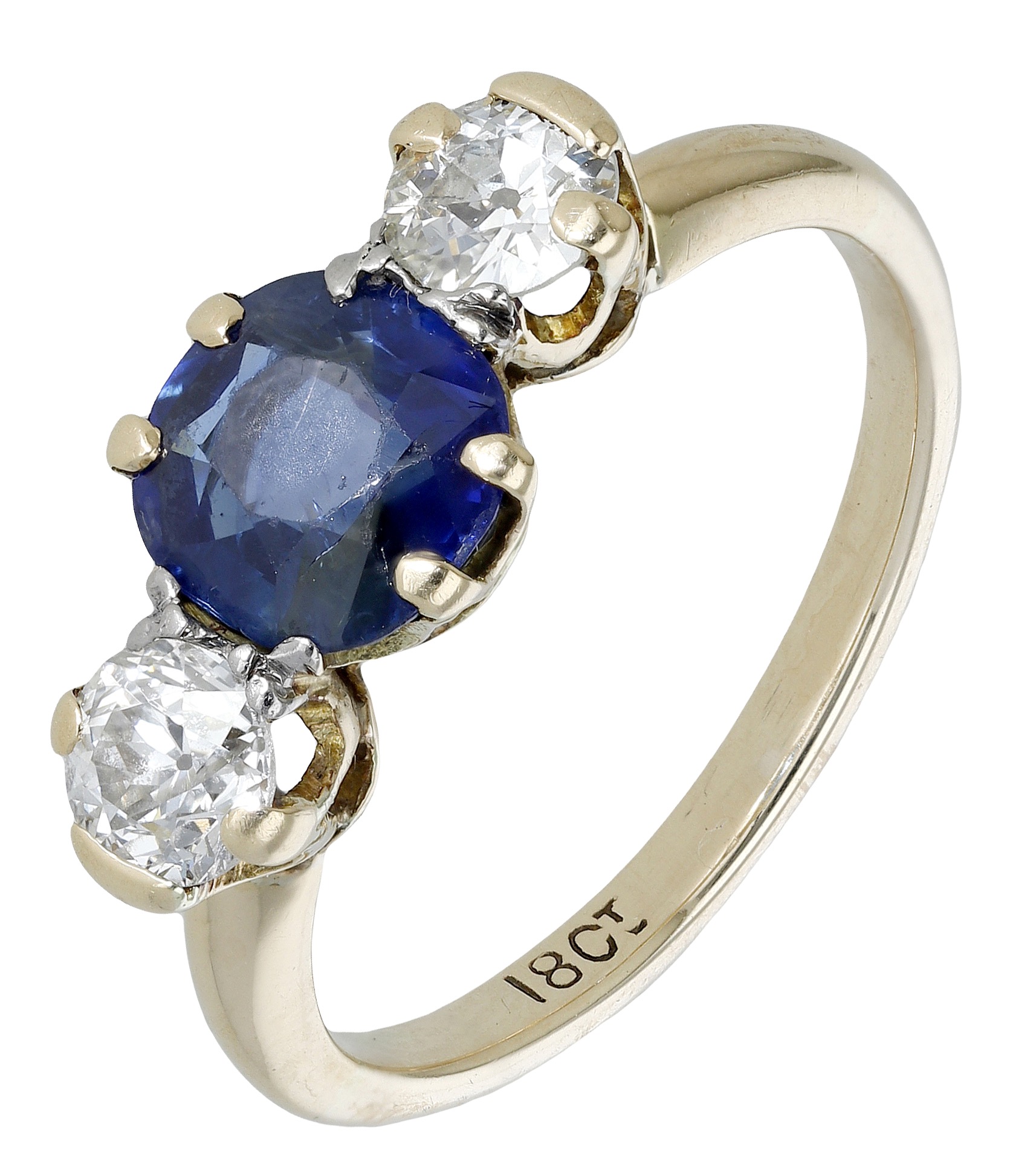 A sapphire and diamond three stone ring, set with a circular-cut sapphire with an old brilli...