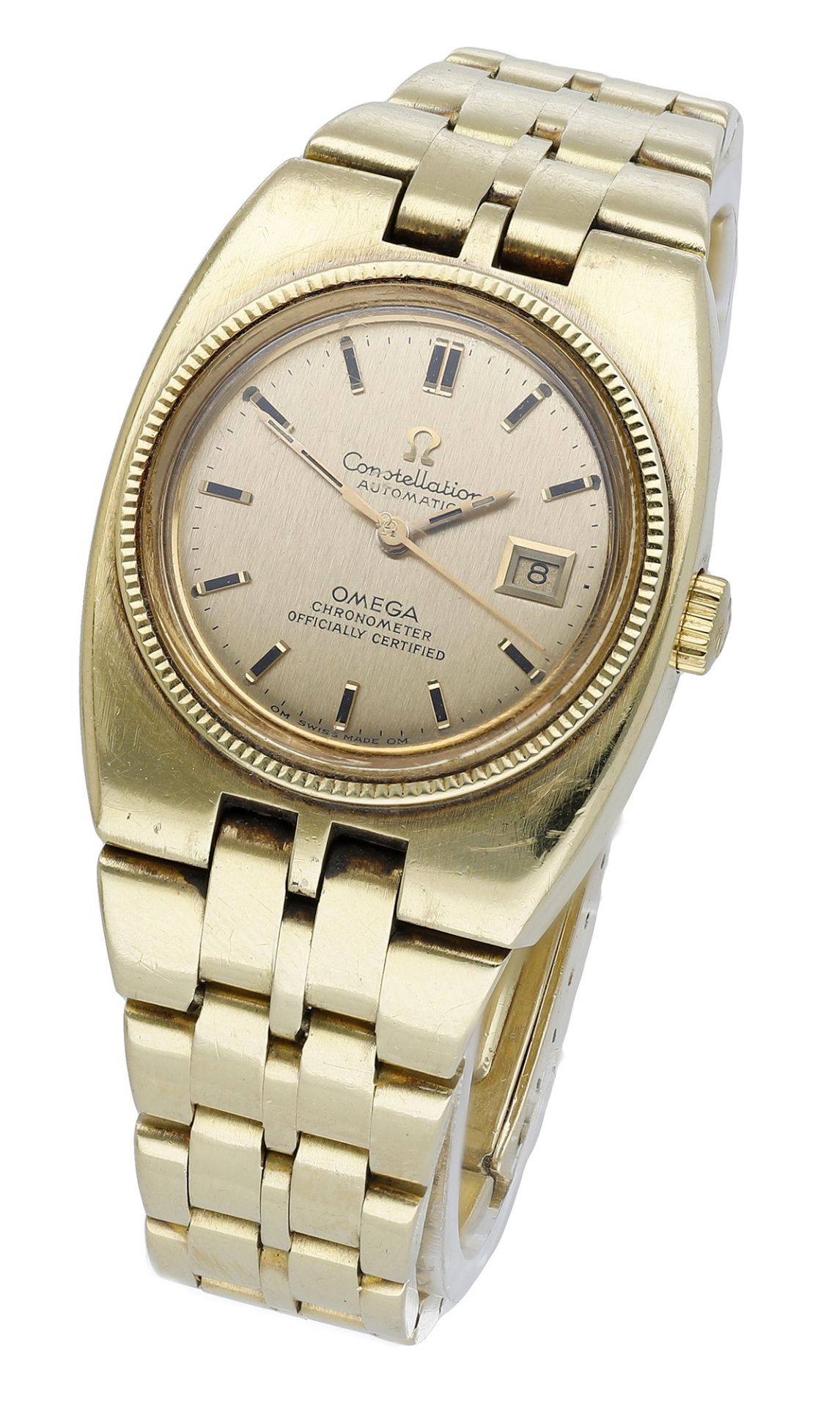 Omega. A lady's gold tonneau-form automatic wristwatch with date and bracelet, Constellation...