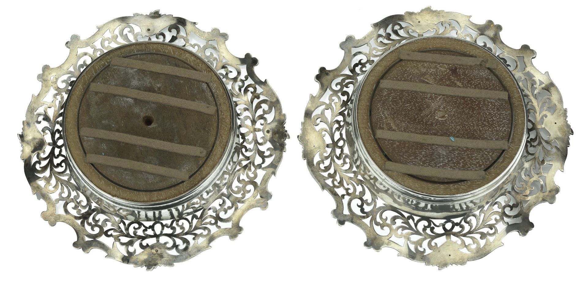 A pair of Victoria silver wine coasters, the broad, scroll-pierced borders with 'C' & 'S' sc... - Bild 2 aus 4