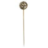 A gold stickpin by WiÃ¨se, French, late 19th century, the roundel modelled as a griffin eatin...