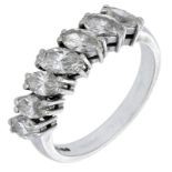 A seven stone diamond ring, diagonally set with a series of marquise-cut diamond, stamped '7...