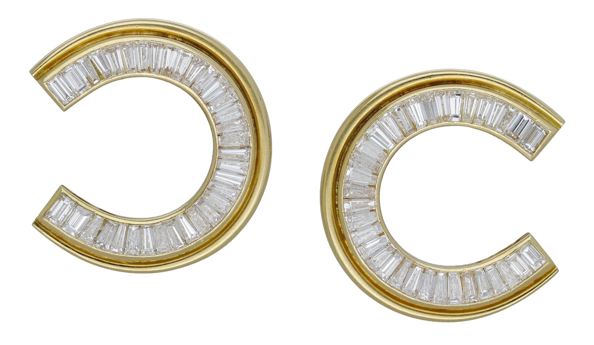 A pair of diamond hoop earrings, 1973, the open hoops set throughout with baguette-cut diamo...