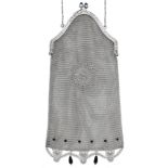 An Art Deco silver mesh link purse, with central pierced motif and black cabochon decoration...