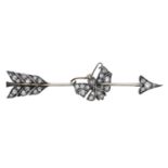 A late 19th century diamond brooch, designed as an arrow with a butterfly to the centre, set...