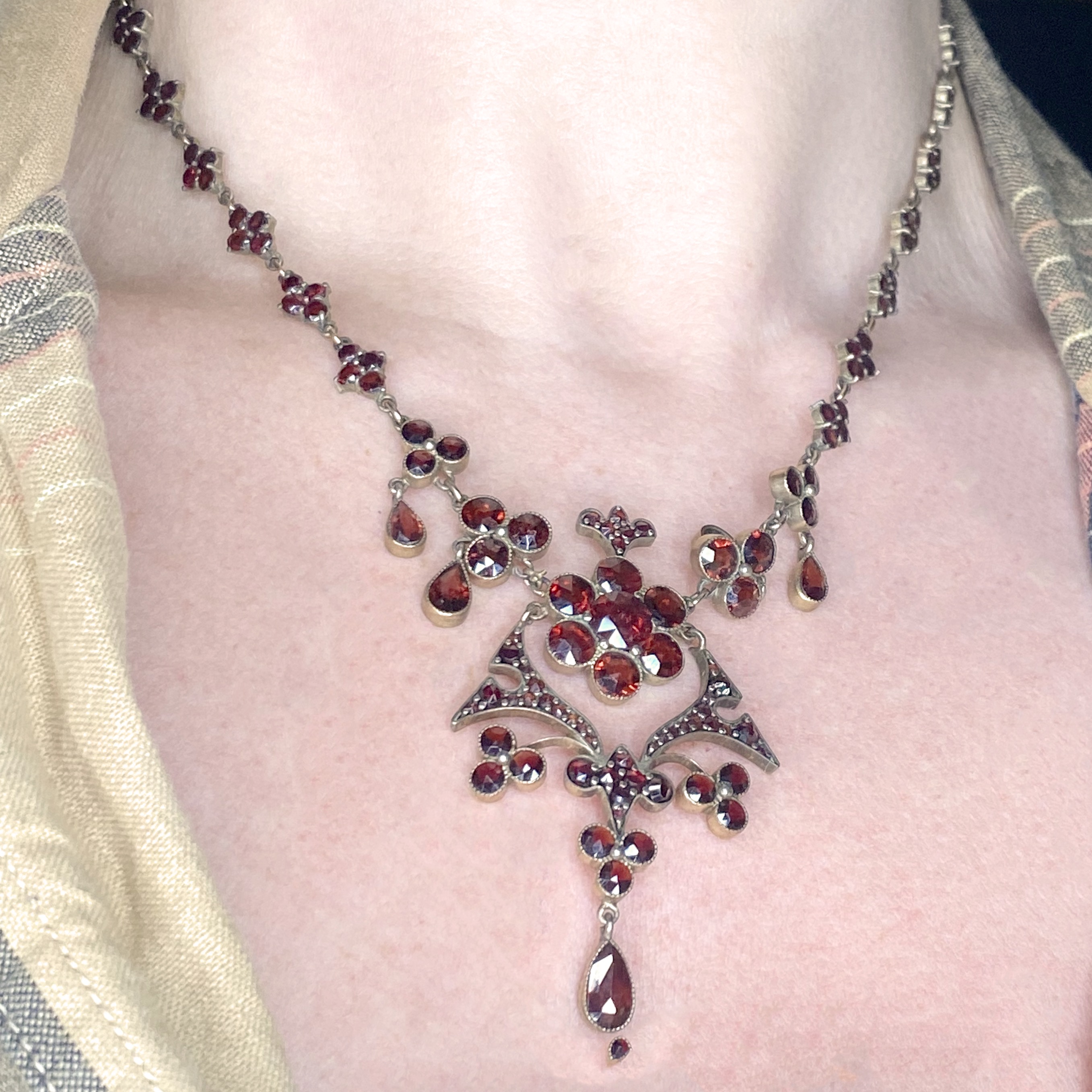 A late 19th century garnet necklace and earring suite, set throughout with vari-cut garnets,... - Image 4 of 4
