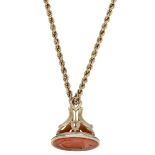 Two 19th century gold mounted carnelian fob seals on chain, the larger panel engraved with a...