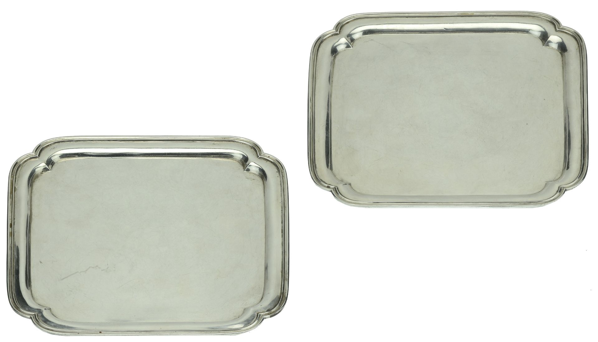 A pair of George V Britannia standard silver salvers, square, with re-entrant corners, by Li...