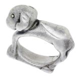 A silver figural ring by Mosheh Oved, circa 1940, the angular design modelled as a lamb, wit...