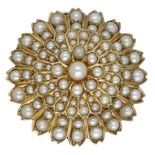 A late 19th century pearl brooch, the tiered design set throughout with seed pearls, glazed...