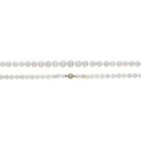 A cultured pearl necklace with diamond clasp, 1982, the graduated row of cultured pearls to...