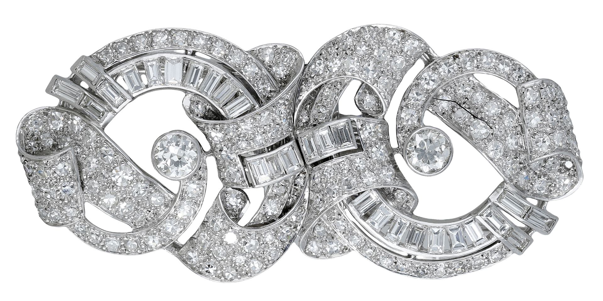 An Art Deco diamond double-clip brooch, circa 1930, of overlapping scrollwork design, set th...