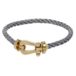 An 18ct gold and steel 'Force 10' bracelet by FRED, the woven steel sailing cable bracelet t...