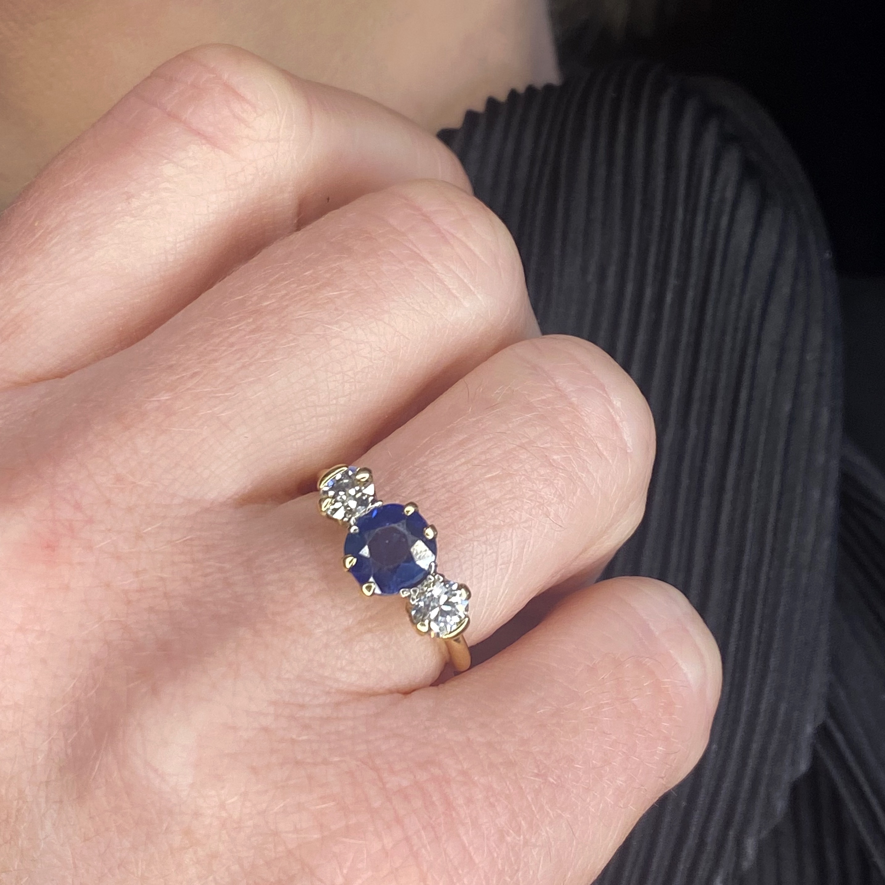 A sapphire and diamond three stone ring, set with a circular-cut sapphire with an old brilli... - Image 3 of 3