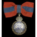 Imperial Service Medal, G.V.R., Lady's badge with wreath (Annie Wilson) mounted on original...