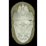A German Second World War Demjansk Shield. A Demjansk Shield with all of its grey finish re...